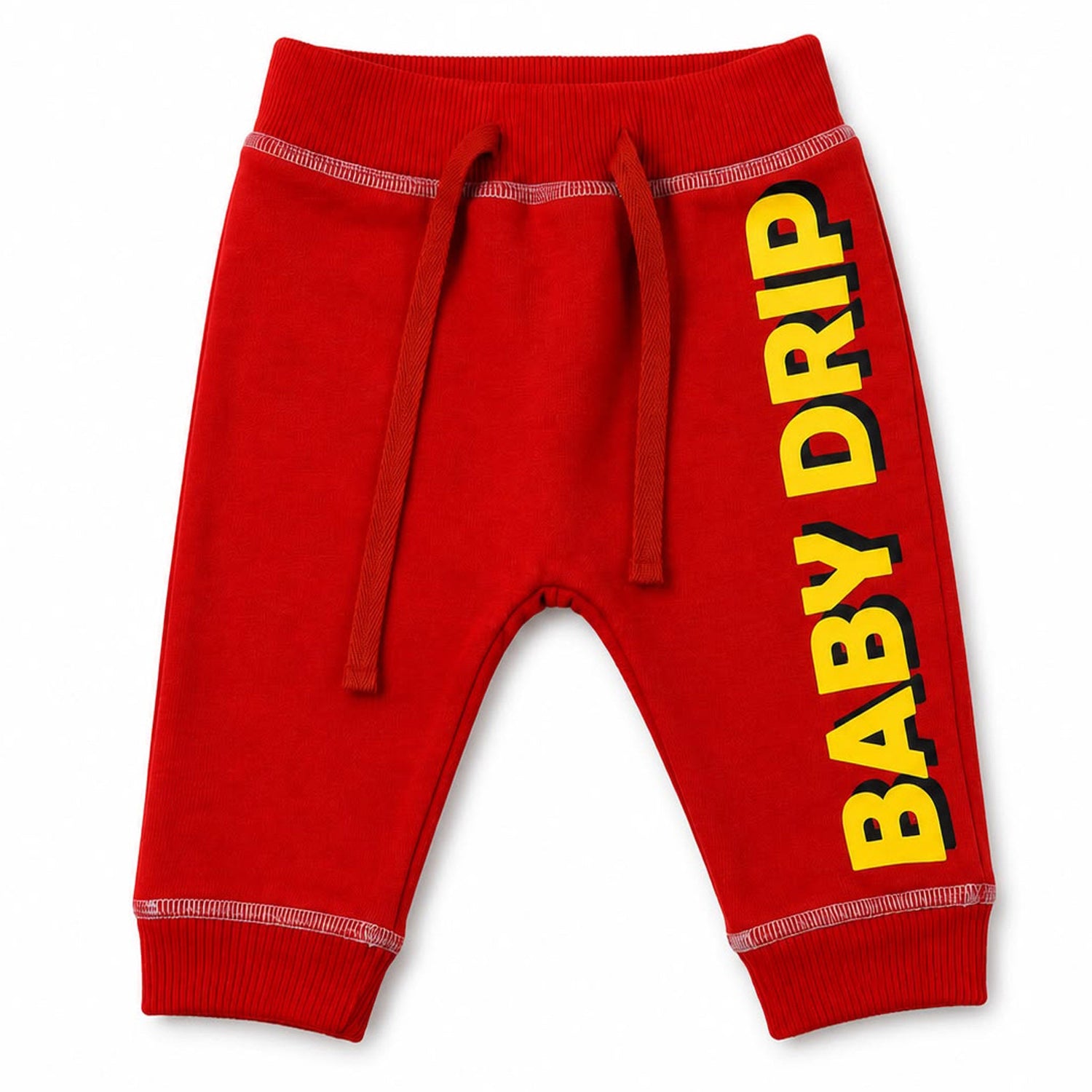 Babydrip Red baby jogger pants with large yellow 'BABY DRIP' text graphic on the right leg, featuring a drawstring waist with white outer stitching on the waist and cuffs. The cuff and waist are also ribbed stretch for comfy and snug fit.