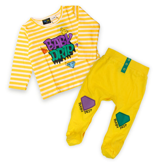 Image of a Babydrip two-piece baby boy outfit set featuring a yellow and white striped long-sleeve shirt with a colorful 'BABY DRIP' graphic, with diamonds on the centered front of the shirt paired with a bright yellow footed pants that have green and purple embroidered diamond patches details with a green horizontal sewn fabric highlighting three silvered round buttons in the front of the pants waist.