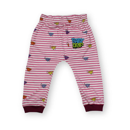 A Babydrip Pink and white striped baby girl pants with colorful baby drip diamond motifs, magenta colored ribbed cuffs and the 'BABY Drip' logo on the back pocket on the right side of the pants, laid out against a plain white background.
