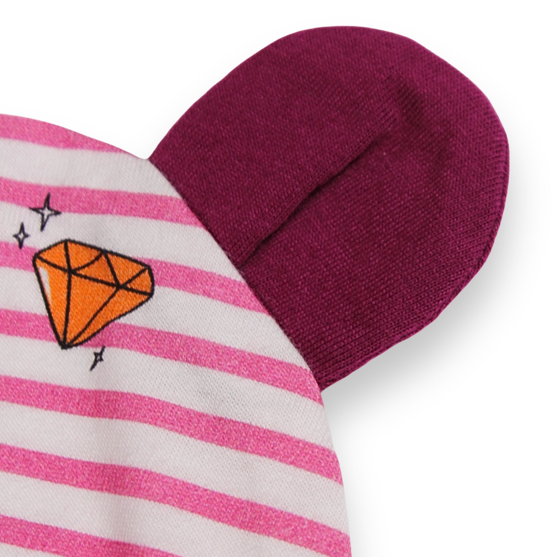 A close up image of a Babydrip Beanie with bunny ears in dark magenta color and pink and white striped highlighting a colorful diamond graphic print motif laid out on a white background.