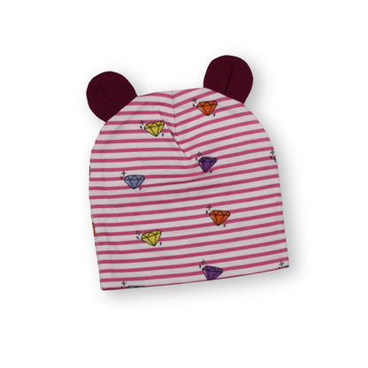 A front image of a Babydrip Beanie that features magenta colored bunny ears, pink and white striped colors on the entire body of the beanie with small colored diamonds motifs, laid out on a white background.
