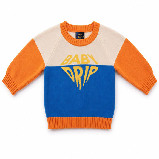 A Babydrip Toddler boy knit sweater with color-blocked livewire blue and lime orange panels, orange ribbed neck, cuff and hem and a yellow 'BABY DRIP' graphic on the chest. Laid out flat on a white background.

