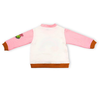 A Babydrip girl long-sleeve sweatshirt top shown from the back, featuring a white body, pink sleeves, brown ribbed trim at the cuffs and hem, and a small green cartoon graphic on the left sleeve laid out on a white background.