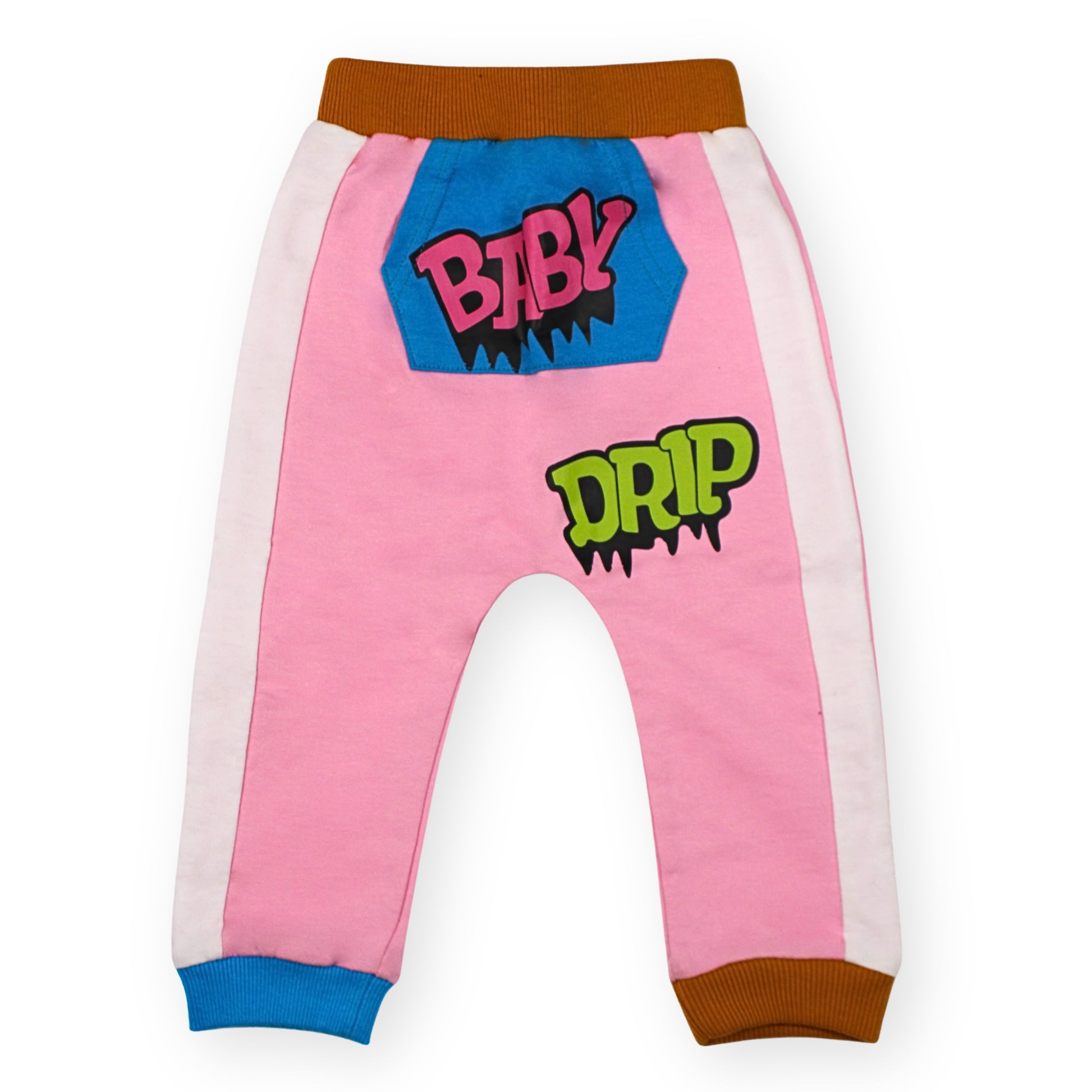 Babydrip pink girls' sweatpant front image, featuring white side panels, brown ribbed elastic waistband and blue and brown cuffs, a blue graphic Kangaroo front pocket patch with pink 'BABY' text, and a green 'DRIP' graphic further down from the pocket, shown on a white background.